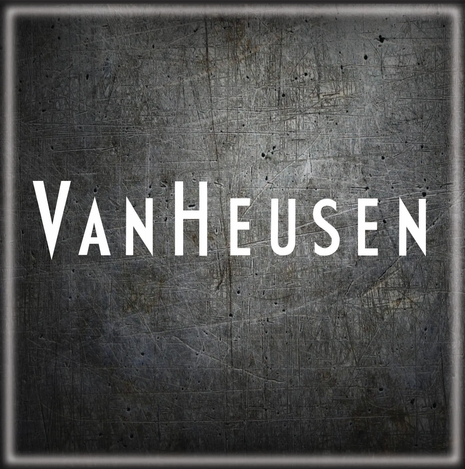 A picture of the word vanheusen on a wall.